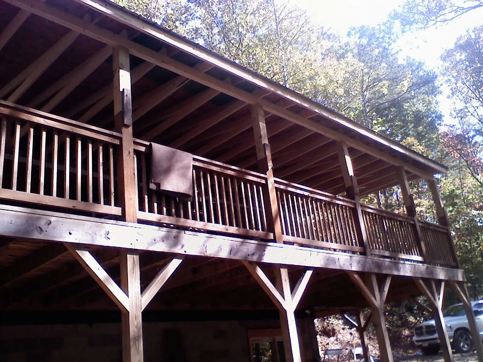 Timber framing under a new elevated porch and deck — Roof Leak Repair in Milburn by Roofing Brothers